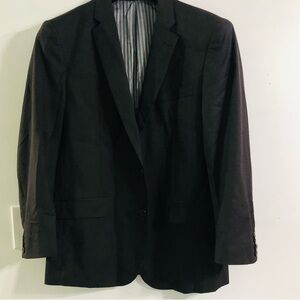 Statement men’s blazers seven pockets front buttons closures tan. 42R